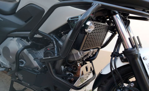Motorcycle luggage racks and pannier systems